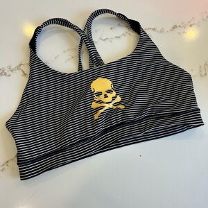 Lululemon black and white striped bra with gold skull